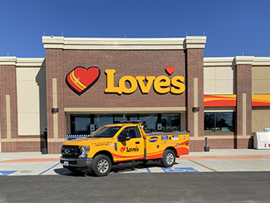 loves travel stop exterior in hamilton alabama with service truck parked in front of it