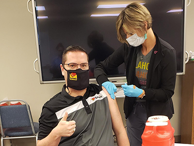 Love's employee receiving COVID-19 vaccine