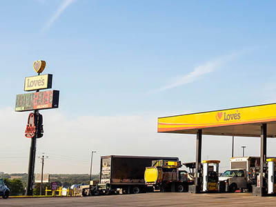 Love's Travel Stop high rise next to gas pumps