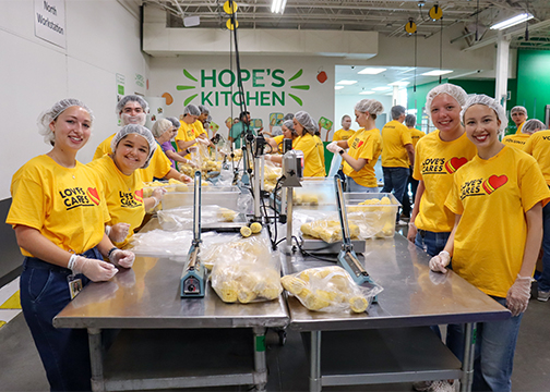 Love's interns volunteering at the Regional Food Bank