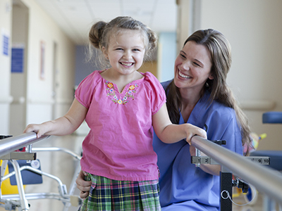 A photo of a Children's Miracle Network patient and doctor